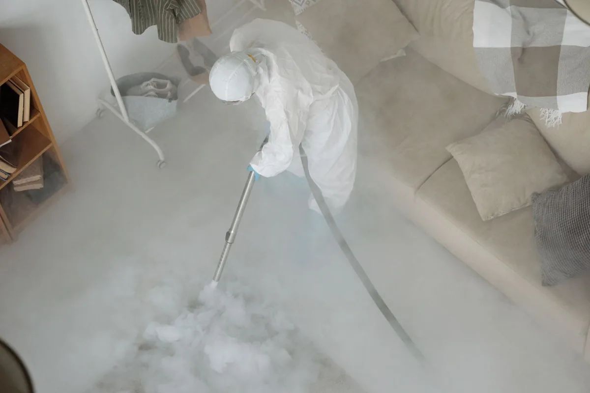 Biohazard cleanup technician in protective equipment, Adair Village, OR